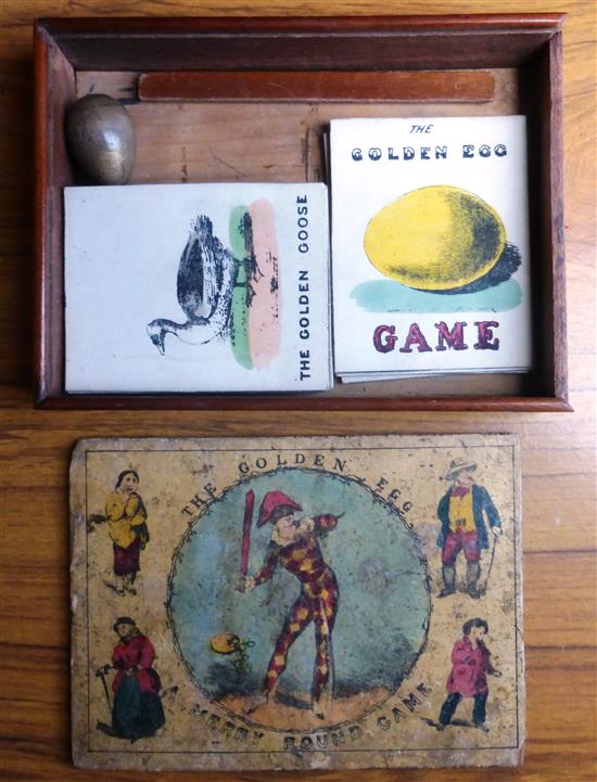 THE MERRY ROUND GAME of THE GOLDEN EGG boxed Card Game by David Ogilvy c1850s in Chestnut box with illustrated lid.